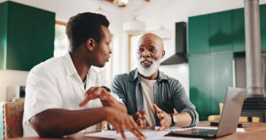 Father and son discussing wealth transfer and IHT
